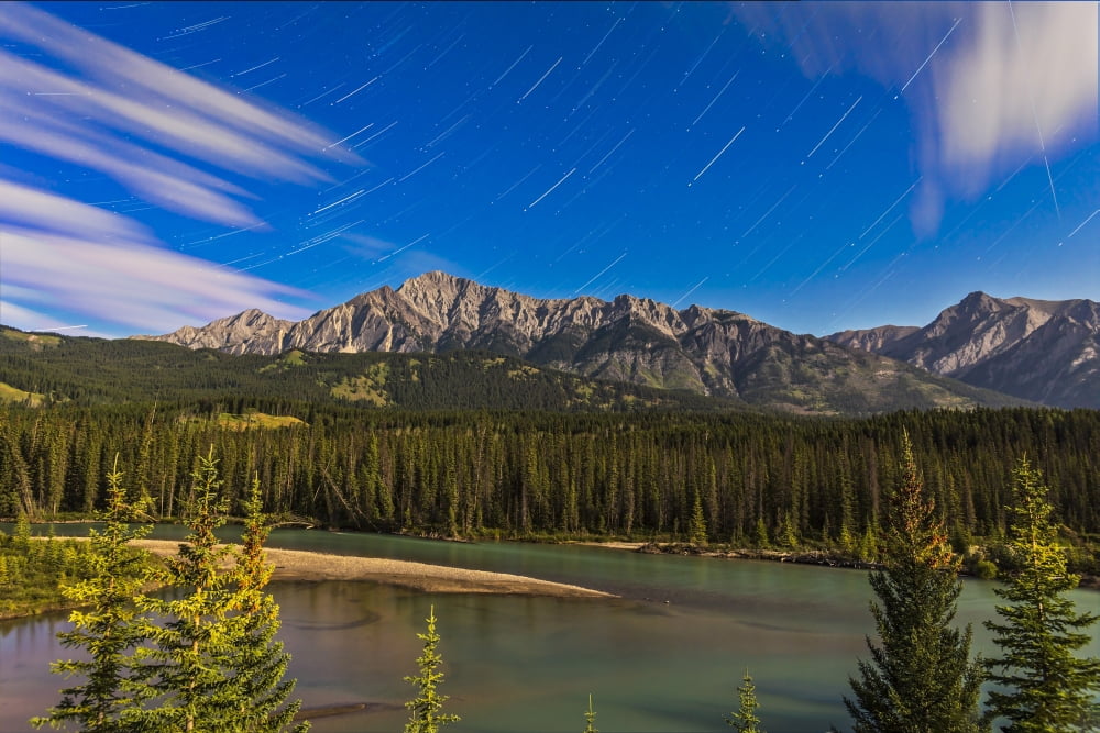 Star trails above the Front Ranges in Banff National Park Alberta Canada Canvas Art - Alan DyerStocktrek Images (35 x 23)
