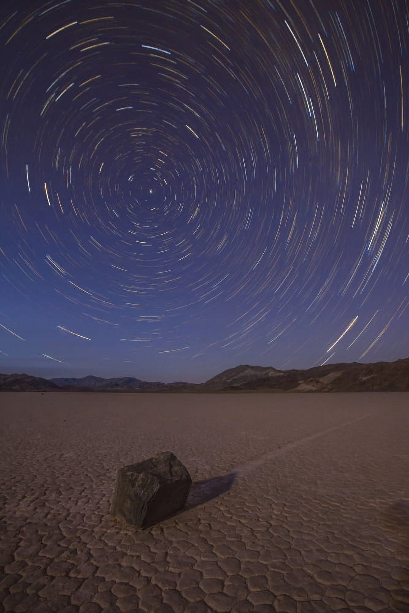 Star trails at the Racetrack Playa in Death Valley National Park California Canvas Art - Dan BarrStocktrek Images (12 x 18)