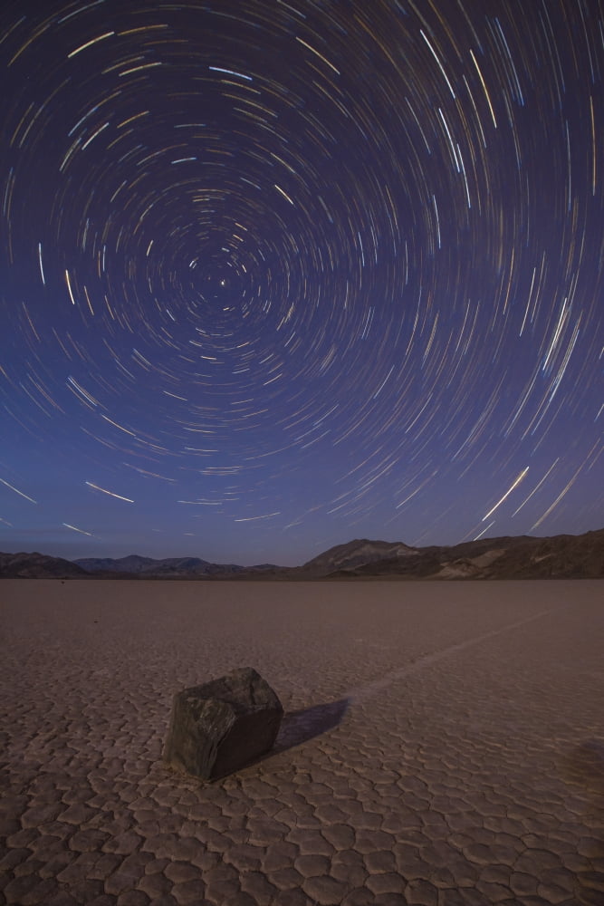 Star trails at the Racetrack Playa in Death Valley National Park California Canvas Art - Dan BarrStocktrek Images (23 x 35)