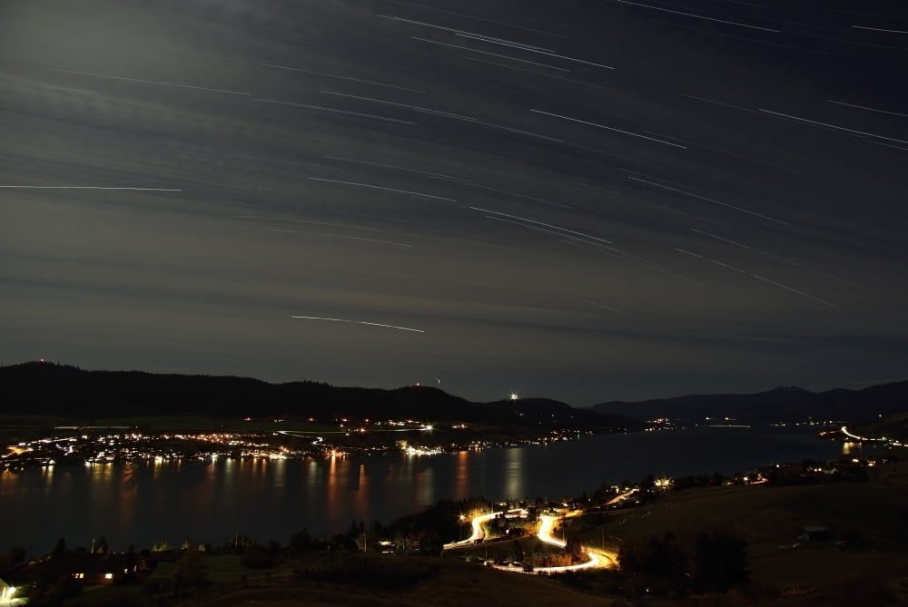 Star trails over Okanagan Lake Vernon British Columbia Canada Canvas Art - Yuichi TakasakaStocktrek Images (17 x 12)