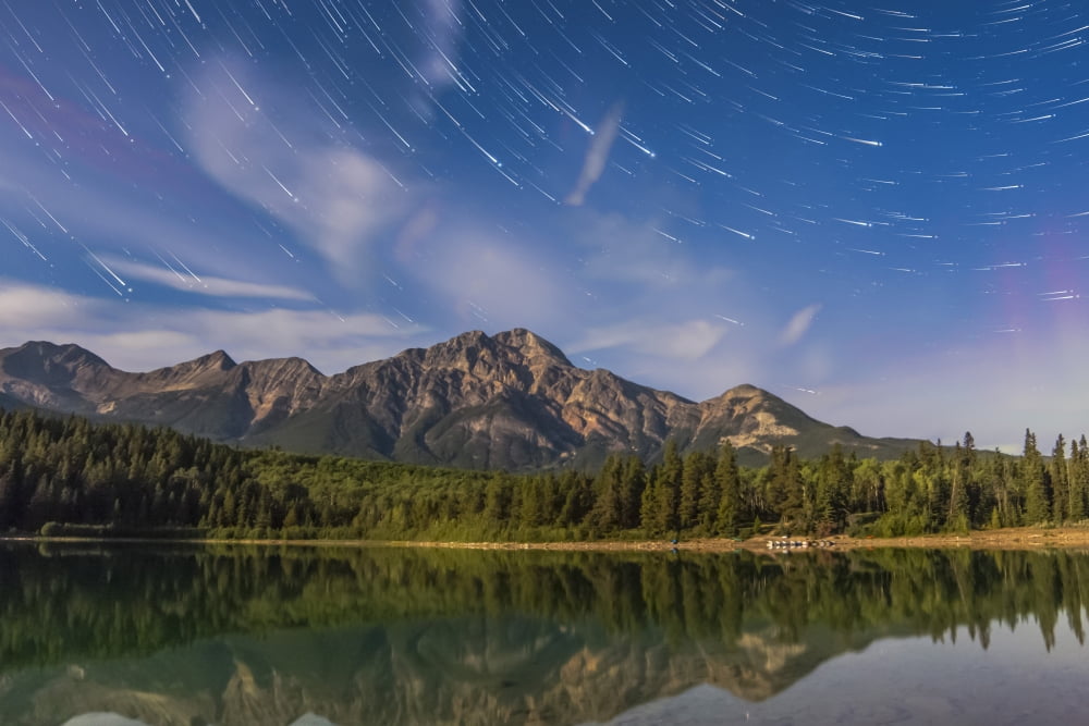 Star trails over Patricia Lake and Pyramid Mountain in Jasper National Park Alberta Canada Canvas Art - Alan DyerStocktrek Images (17 x 12)