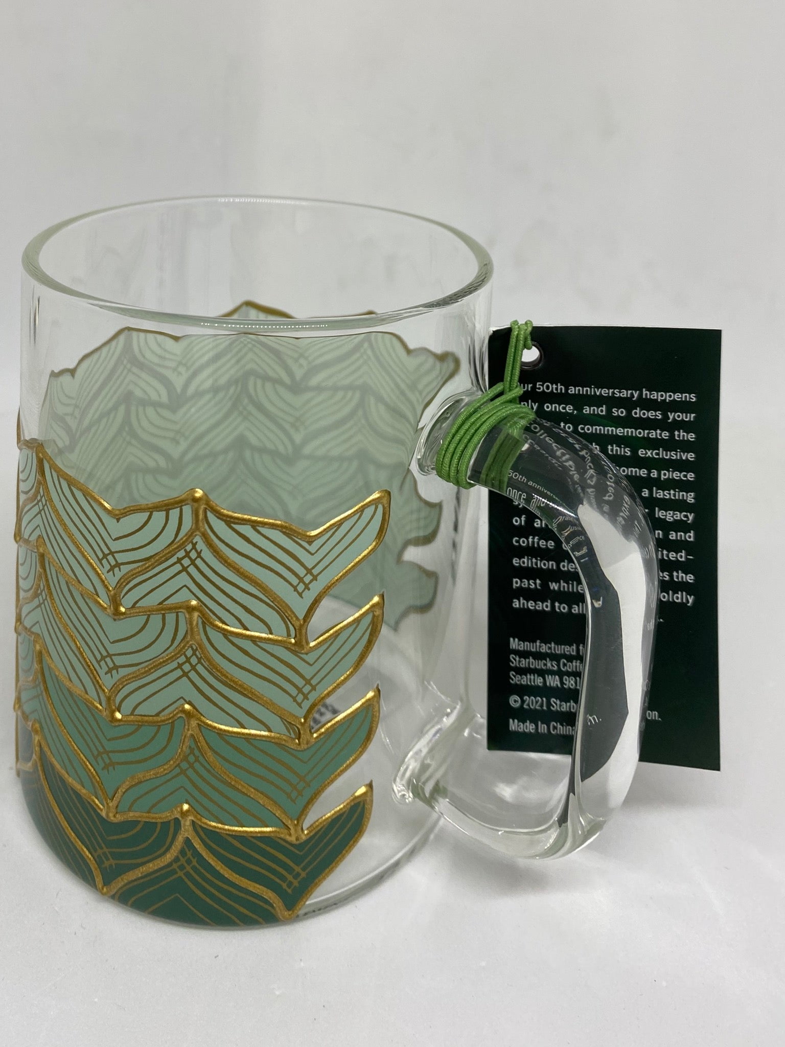 https://i5.walmartimages.com/seo/Starbucks-50th-Anniversary-Siren-Tail-Glass-Mug-Limited-New-with-Tag_500bbb05-60fe-41a9-a9f1-30d8ae198985.287710c181f9b89d6c3f860f1038dbf1.jpeg