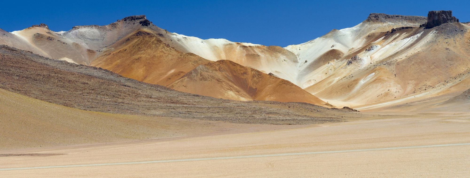 Stark mountain landscape in the high altiplano of Eduardo Avaroa Andean Fauna National Reserve Potosi Department Bolivia Canvas Art - Panoramic Images (27 x 9)