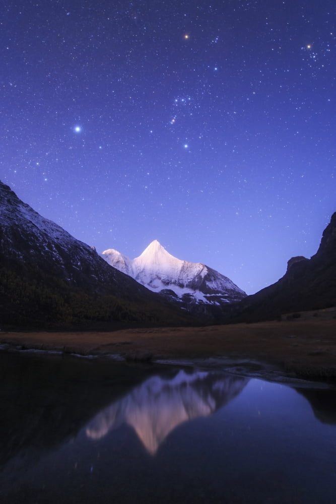 Starry sky at the break of dawn over Mt Jampayang in China Canvas Art - Jeff DaiStocktrek Images (12 x 17)