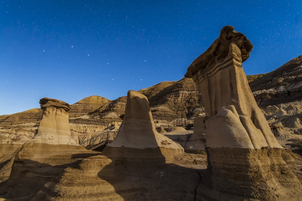 Stars over the hoodoos in the Red Deer River valley Alberta Canada Canvas Art - Alan DyerStocktrek Images (35 x 23)