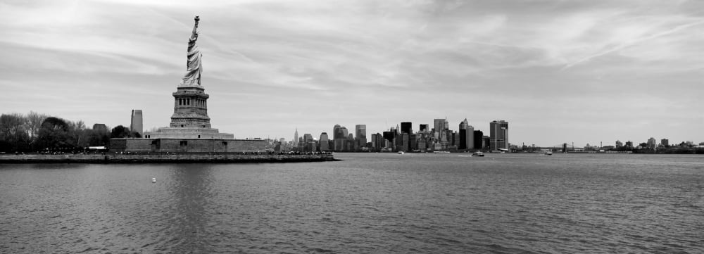 Statue Of Liberty with Manhattan skyline in the background Ellis Island New Jersey New York City New York State USA Canvas Art - Panoramic Images (7 x 18)