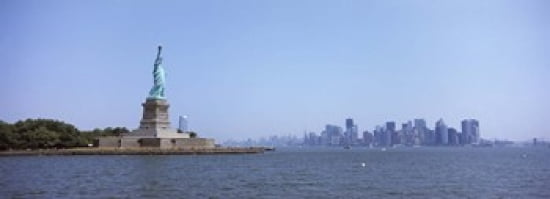 Statue Of Liberty with Manhattan skyline in the background Liberty Island New York City New York State USA 2011 Canvas Art - Panoramic Images (36 x 13)