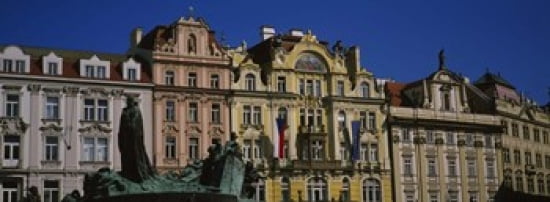 Statue in front of buildings Jan Hus Monument Prague Old Town Square Old Town Prague Czech Republic Canvas Art - Panoramic Images (36 x 13)