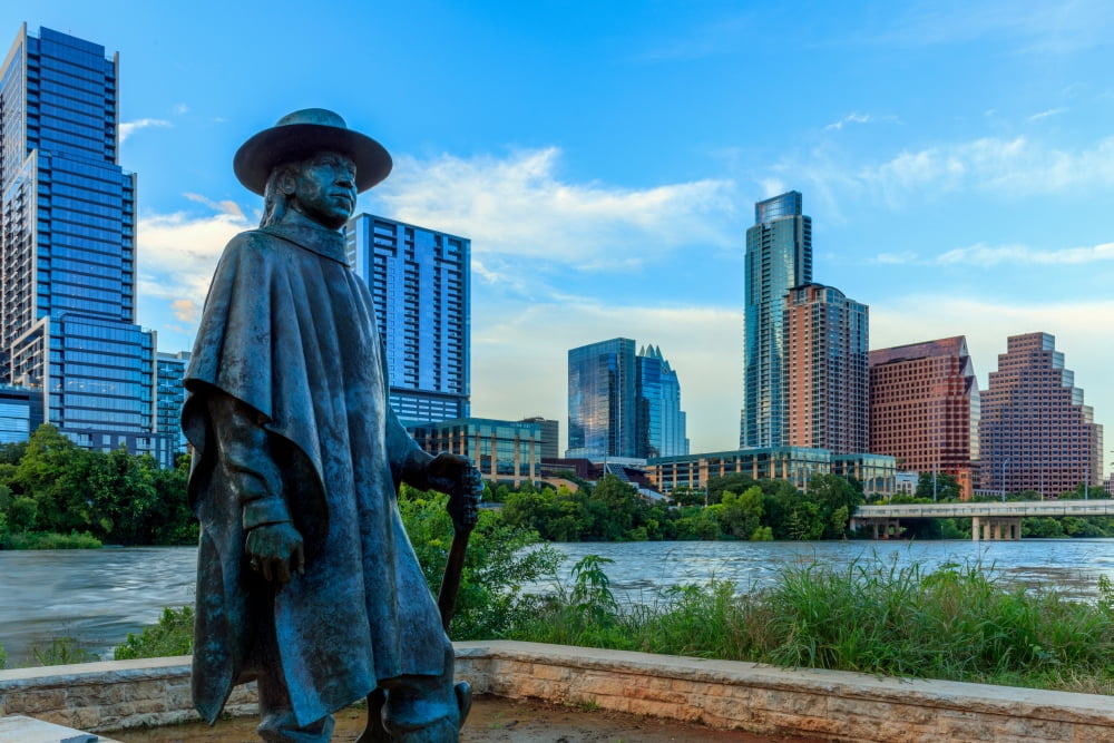 Statue of Stevie Ray Vaughan on the shore of Lady Bird Lake in downtown Austin Texas USA Canvas Art - Panoramic Images (18 x 24)