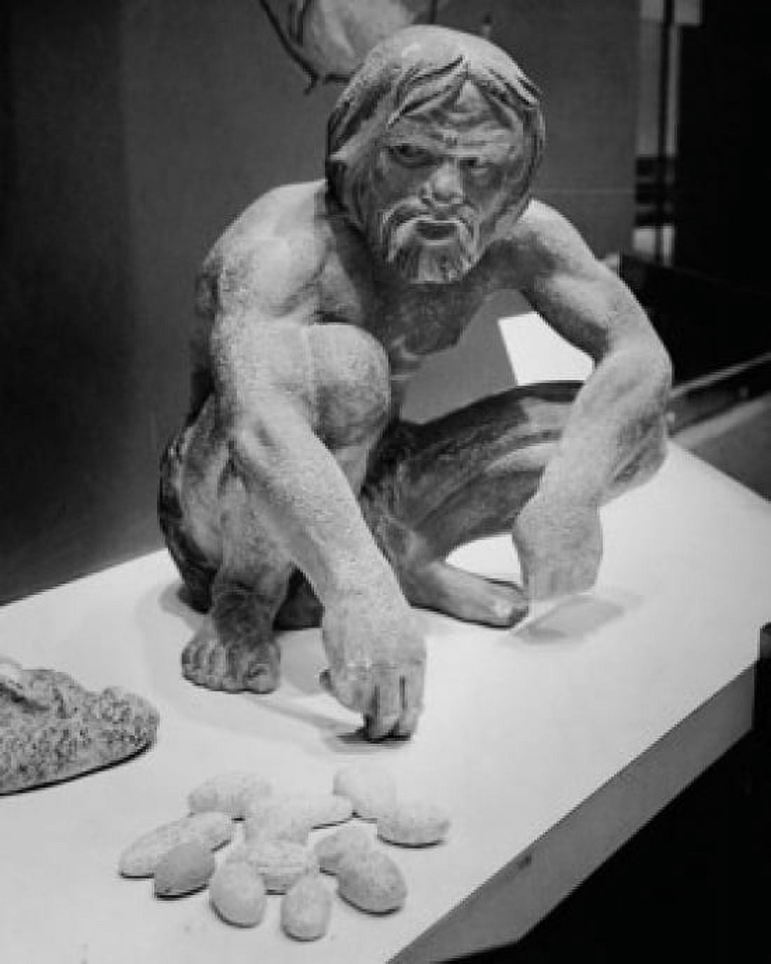 Statue of a caveman using stones to calculate Canvas Art - (18 x 24)