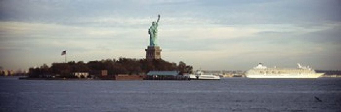 Statue on an island in the sea Statue of Liberty Liberty Island New York City New York State USA Canvas Art - Panoramic Images (18 x 6)