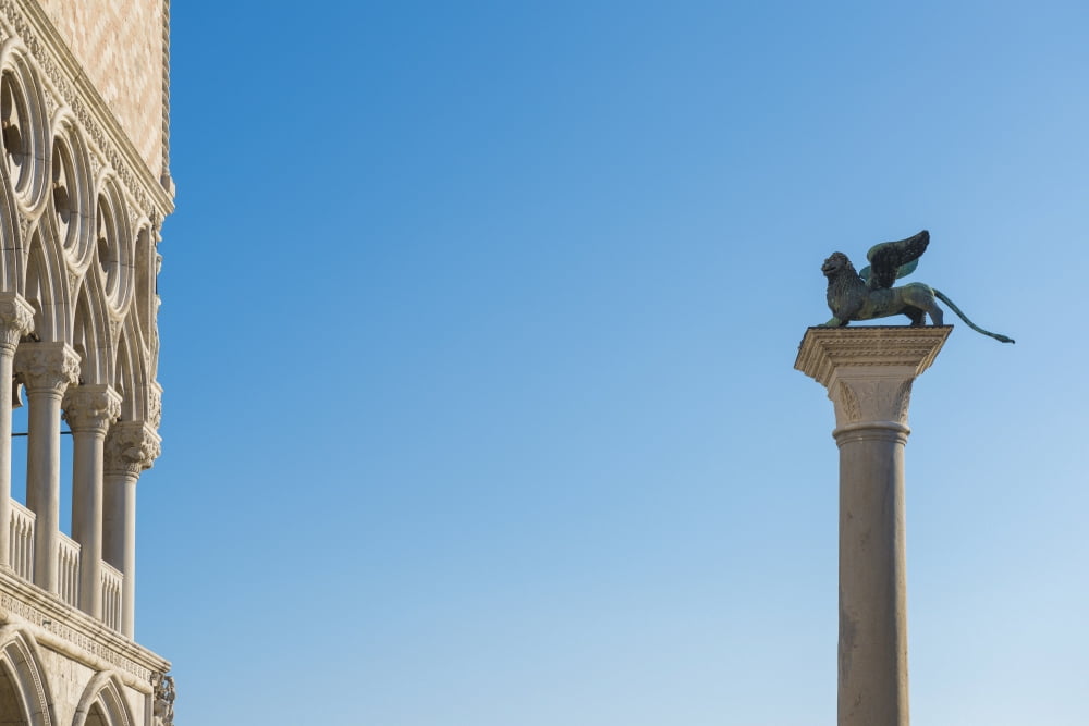 Statue on top of a column monument against a blue sky Venice Veneto Italy Canvas Art - Mats Silvan Design Pics (38 x 24)