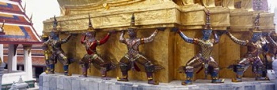 Statues at base of golden chedi The Grand Palace Bangkok Thailand Canvas Art - Panoramic Images (36 x 12)