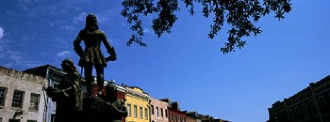 Statues in front of buildings French Market French Quarter New Orleans Louisiana USA Canvas Art - Panoramic Images (18 x 7)