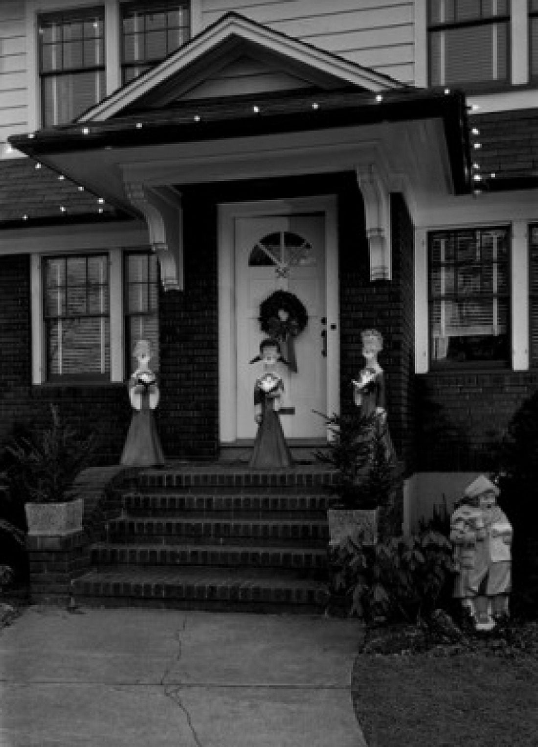 Statues of women outside house Canvas Art - (24 x 36)