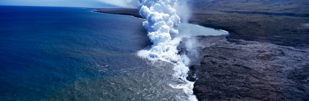 Steam rising off lava flowing into ocean Hawaii Volcanoes National Park Big Islands Hawaii USA Canvas Art - Panoramic Images (6 x 18)