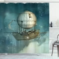 thumbnail image 1 of Steampunk Shower Curtain, Fantastic Airship Flying Over a Futuristic Town Full of Skyscrapers, Fabric Bathroom Set with Hooks, 69W X 70L Inches, Petrol Blue and Tan, by Ambesonne, 1 of 3