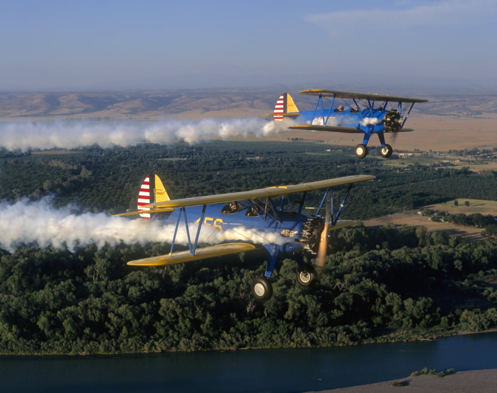 Stearman PT-17 Kaydets flying over Red Bluff California Canvas Art - Phil WallickStocktrek Images (16 x 13)