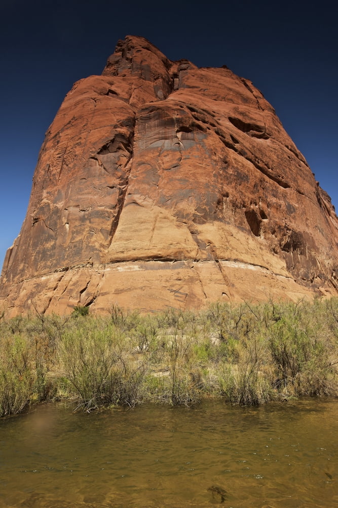 Steep cliffs guard the Colorado River near Horseshoe Bend Arizona Canvas Art - Terry MooreStocktrek Images (12 x 18)