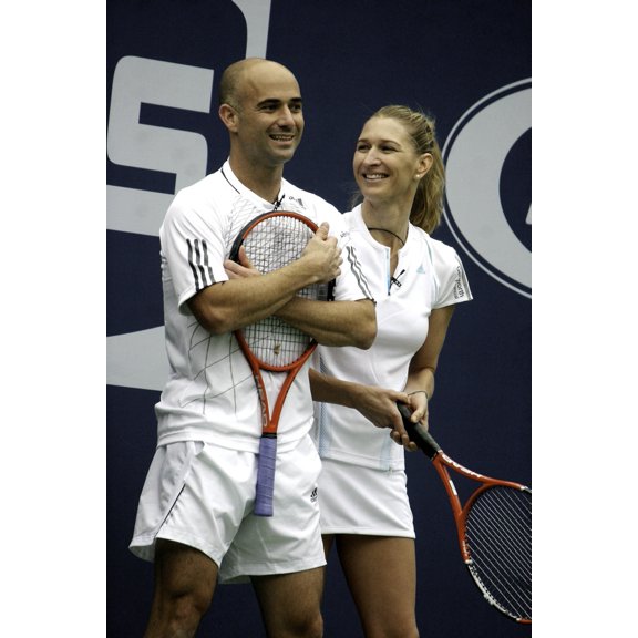 Steffi Graff smiling at Andre Agassi Photo Print (8 x 10)