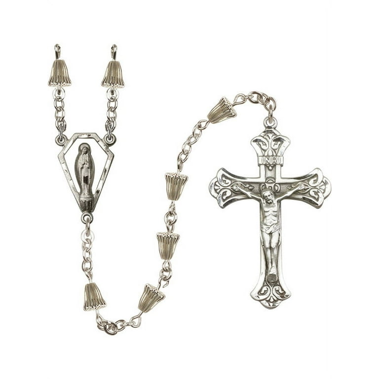 THE CROSS bells and beads THE CROSS bells and beads
