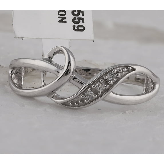 Sterling Silver Womens Round Diamond Twist Fashion Band Ring .03 Cttw