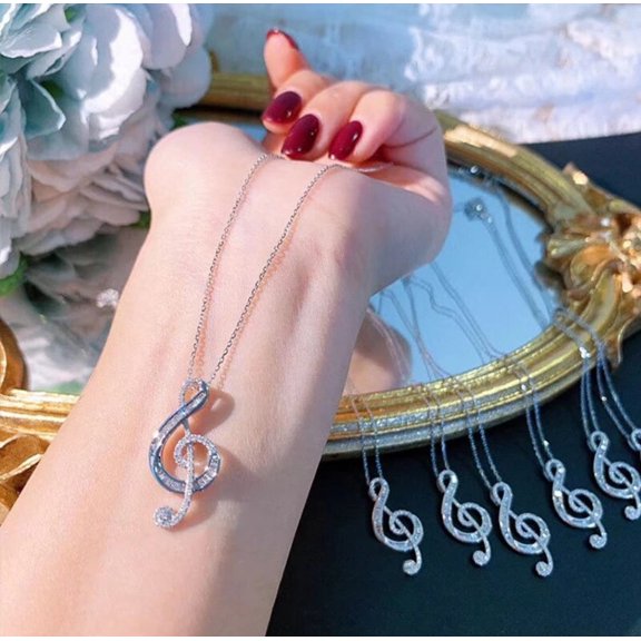 Sterling silver 18" chain and clear stone music note pendant necklace