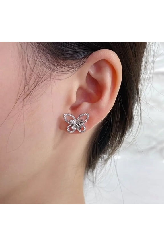 Sterling silver pierced 1/2" silver and clear stone cutout butterfly earrings