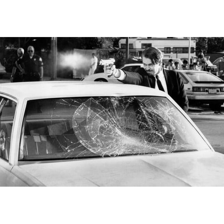 Steve Buscemi in Reservoir Dogs fires gun over roof of car 24x36