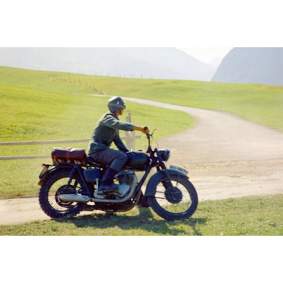 Steve McQueen in The Great Escape on Triumph Motorcycle German uniform Alps 24x36 Poster