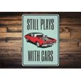 thumbnail image 1 of Still Plays With Cars Garage Novelty Sign, Metal Wall Decor - 10x14 inches, 1 of 4