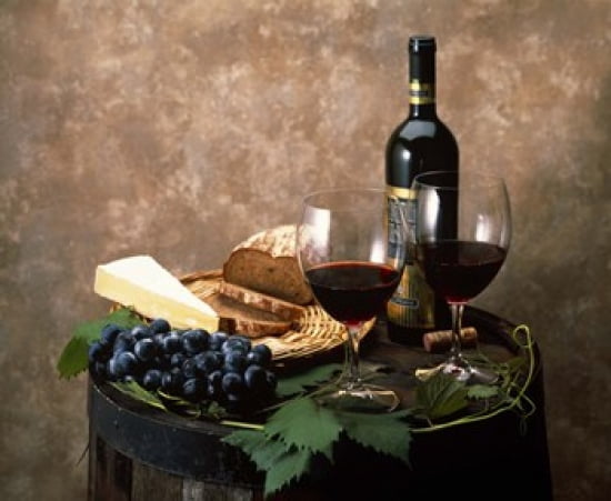 Still life of wine bottle wine glasses cheese and purple grapes on top of barrel Canvas Art - Panoramic Images (36 x 30)