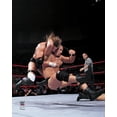 thumbnail image 1 of "Stone Cold" Steve Austin WWE Unsigned Stunner on Triple H Photograph, 1 of 1