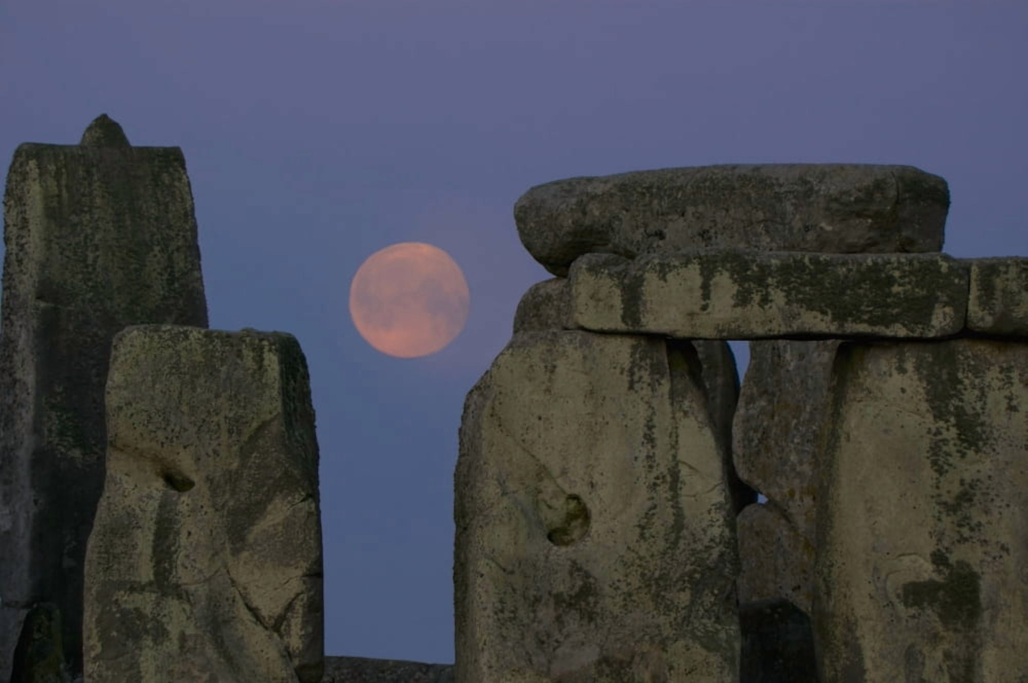 Stonehenge with a harvest moon Wiltshire England Canvas Art - Charles Bowman Design Pics (38 x 24)