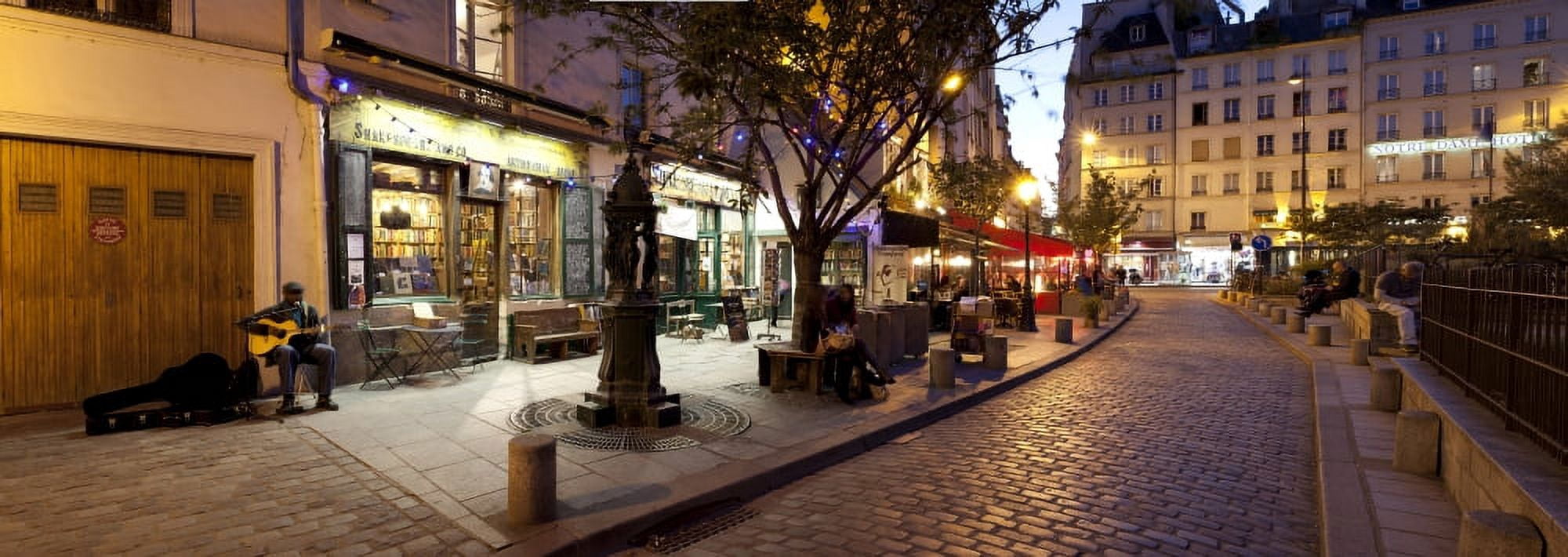 Stores at dusk Paris Ile-de-France France Canvas Art - Panoramic Images (27 x 9)