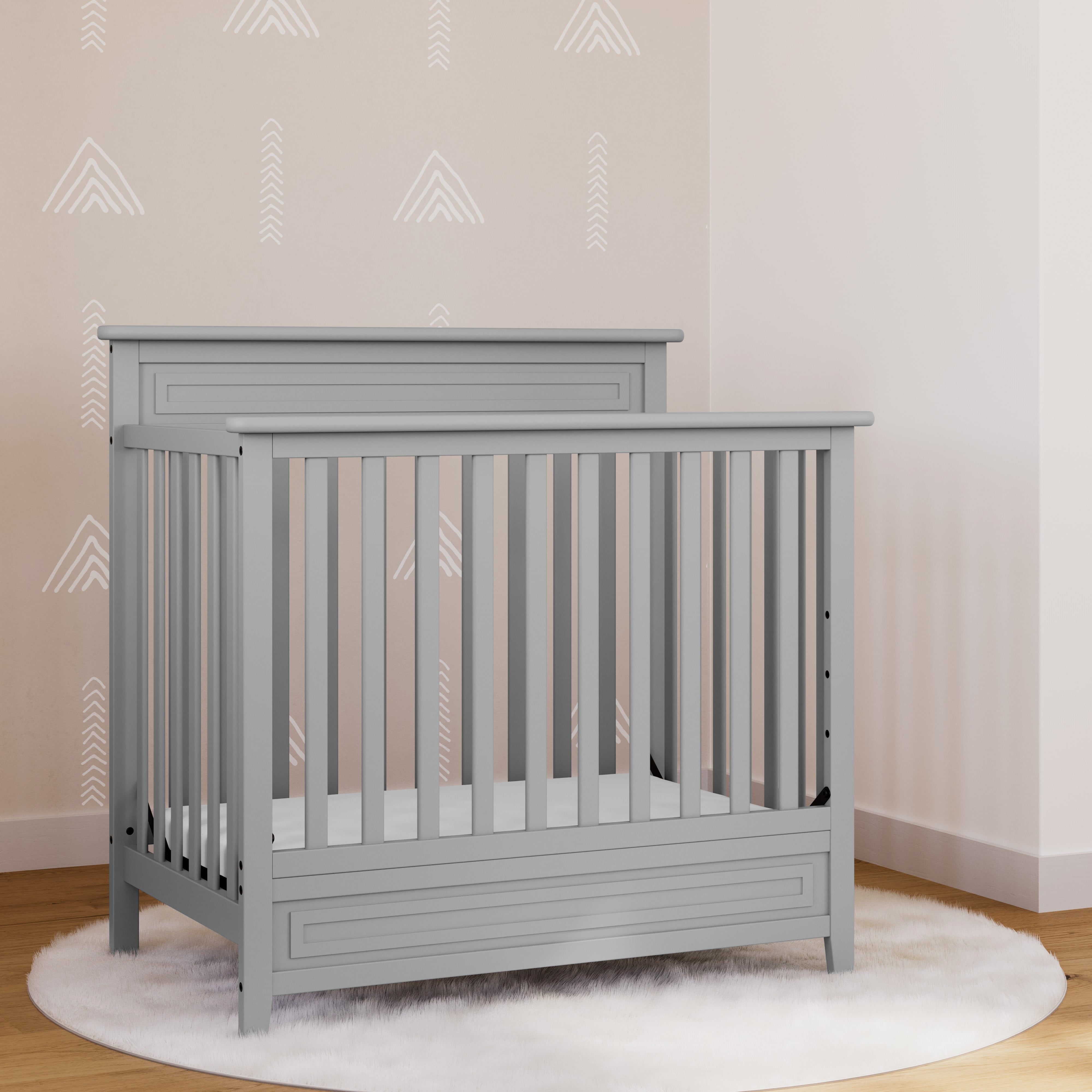Storkcraft Petal Mini 4-in-1 Convertible Baby Crib with Mattress, Pebble Gray