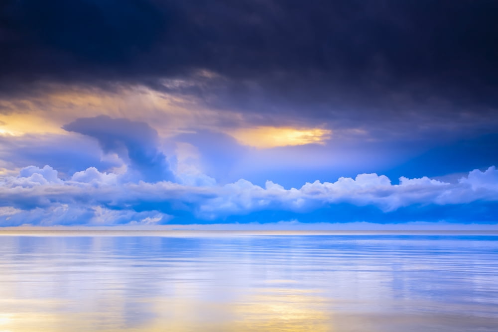 Storm Clouds And Lake Winnipeg At Sunrise Gimli Manitoba Canvas Art - Ken Gillespie Design Pics (34 x 22)