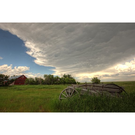 Storm Clouds Gather Over An Abandoned Farm Stead Rural Saskatchewan Canvas Art - Robert Postma  Design Pics (17 x 11)