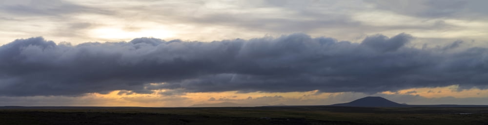 Storm clouds over First Mountain at sunset Pebble Island Falkland Islands Canvas Art - Panoramic Images (27 x 9)