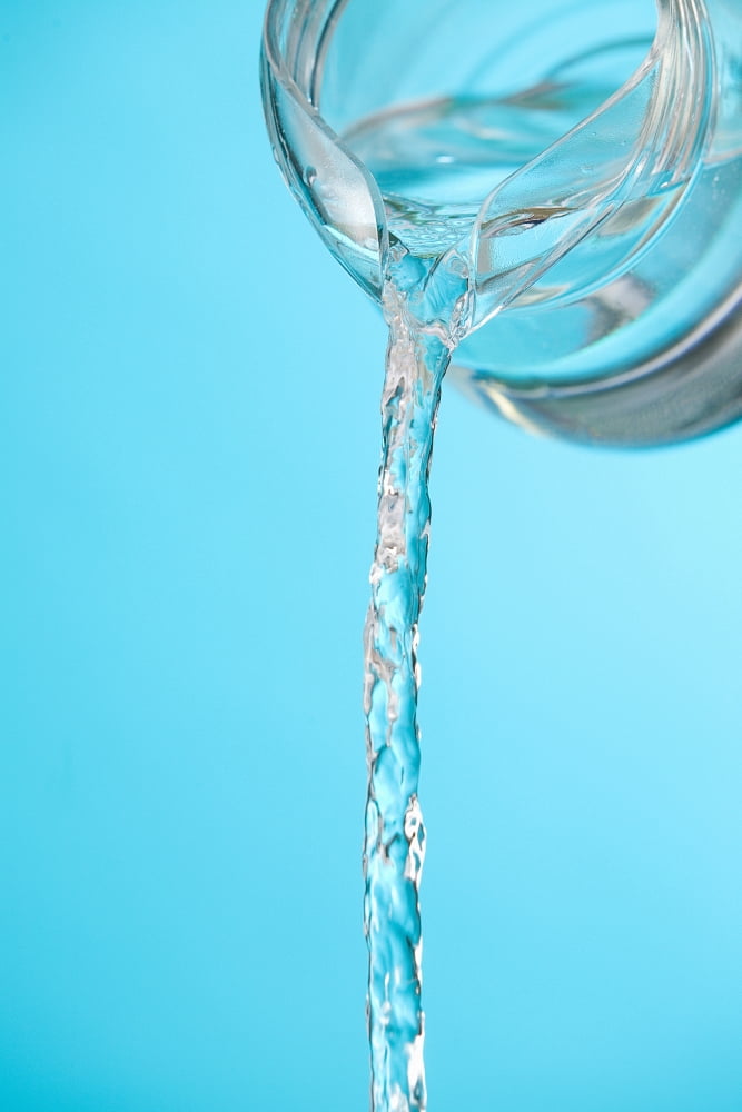 Stream Of Water Being Poured From A Pitcher Canvas Art - Greg Huszar Photography Design Pics (24 x 36)