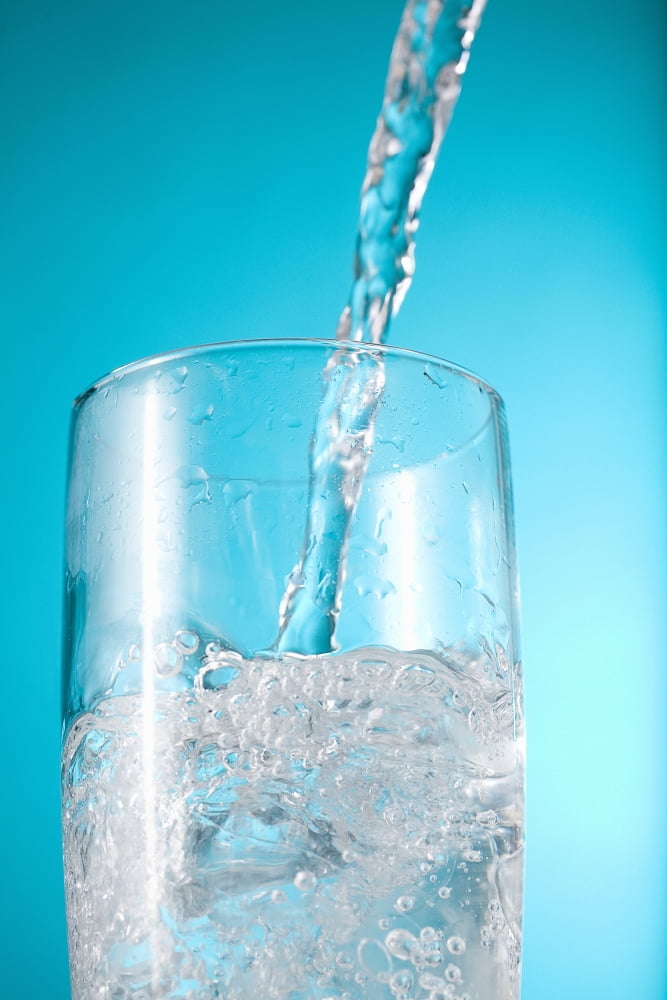 Stream Of Water Being Poured Into A Clear Glass Canvas Art - Greg Huszar Photography Design Pics (24 x 36)