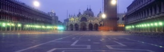 Street lights lit up in front of a cathedral at sunrise St Marks Cathedral St Marks Square Venice Veneto Italy Canvas Art - Panoramic Images (36 x 12)