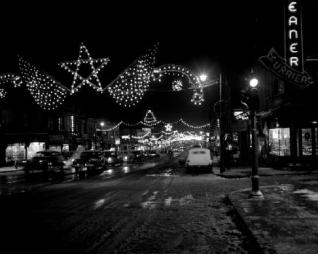 Street with Christmas decorations at night Canvas Art - (24 x 36)