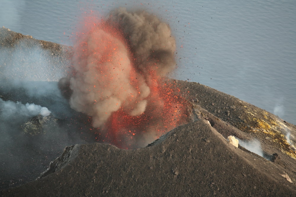 Strombolian eruption of Stromboli volcano producing ash cloud volcanic bombs and lava Italy Canvas Art - Richard RoscoeStocktrek Images (35 x 23)