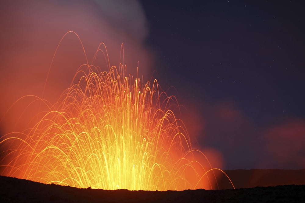 Strombolian eruption on starlit night Yasur Volcano Tanna Island Vanuatu Canvas Art - Richard RoscoeStocktrek Images (18 x 12)