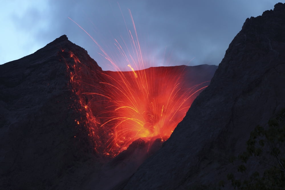 Strombolian type eruption of Batu Tara volcano Indonesia Canvas Art - Richard RoscoeStocktrek Images (18 x 12)