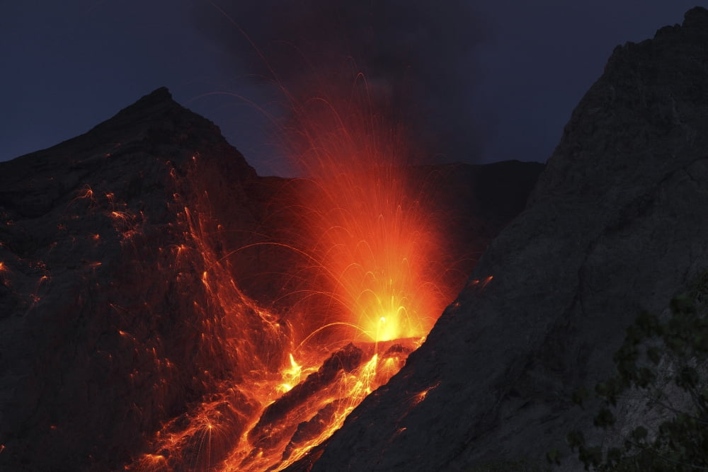 Strombolian type eruption of Batu Tara volcano Indonesia Canvas Art - Richard RoscoeStocktrek Images (18 x 12)