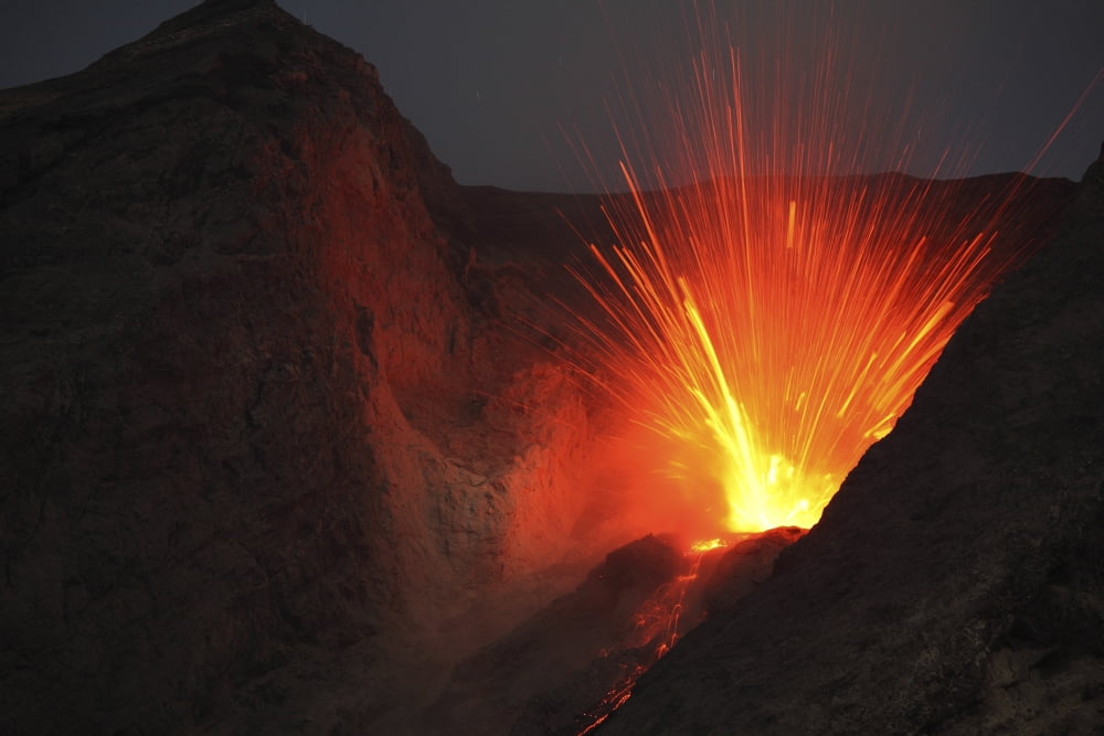 Strombolian type eruption of Batu Tara volcano Indonesia Canvas Art - Richard RoscoeStocktrek Images (18 x 12)