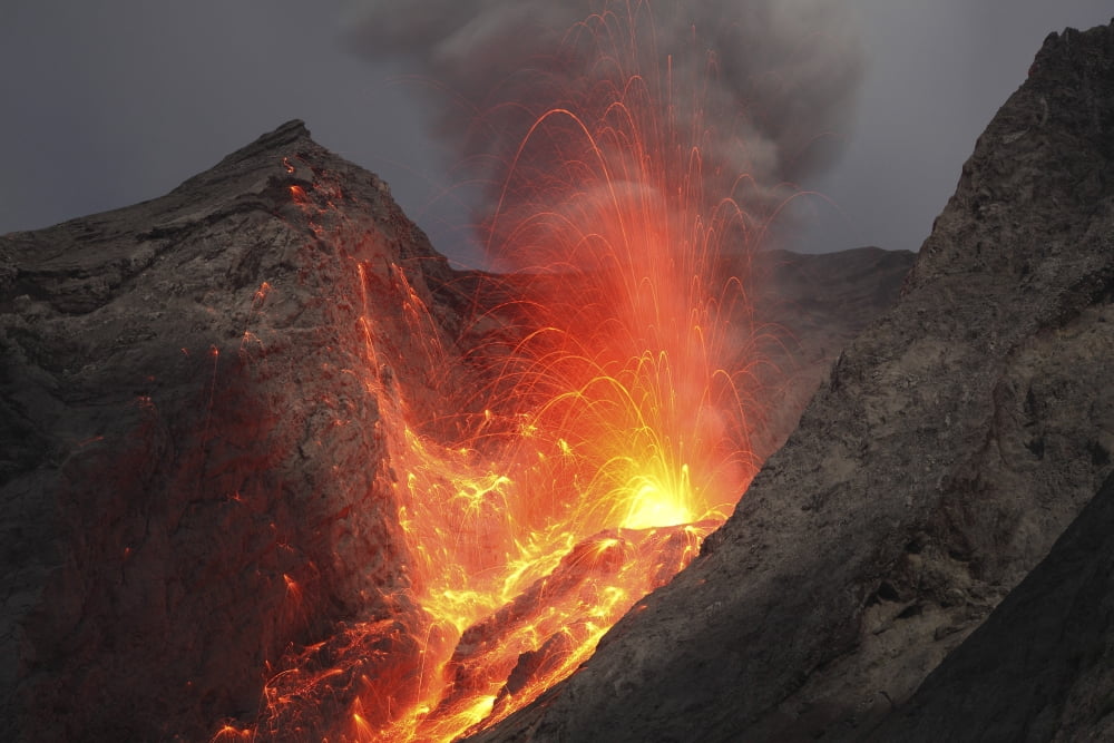 Strombolian type eruption of Batu Tara volcano Indonesia Canvas Art - Richard RoscoeStocktrek Images (18 x 12)