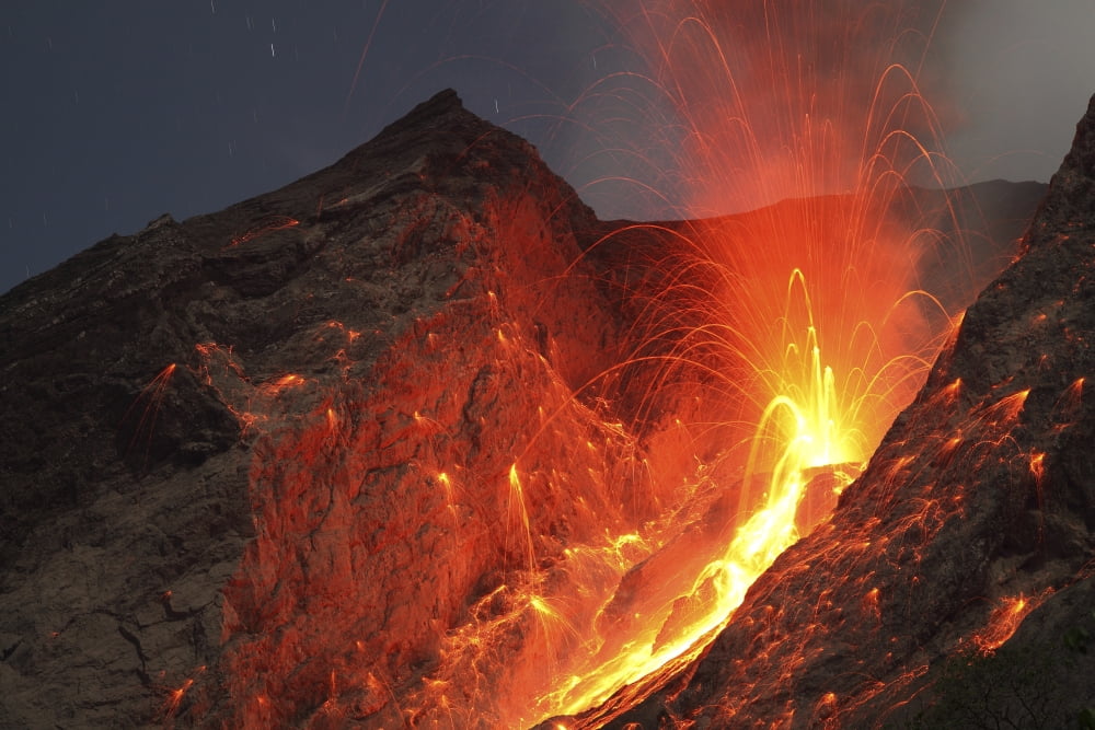 Strombolian type eruption of Batu Tara volcano Indonesia Canvas Art - Richard RoscoeStocktrek Images (18 x 12)